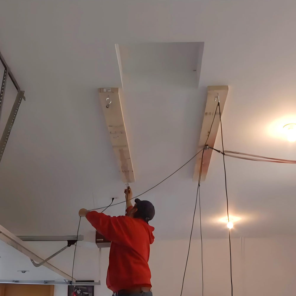 ALLCOS lift stores the hardtop against the ceiling, freeing floor space.