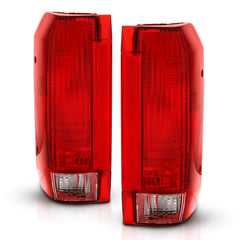 AmeriLite tail light assembly, passenger side for Bronco/F-150, enhances signaling and safety.