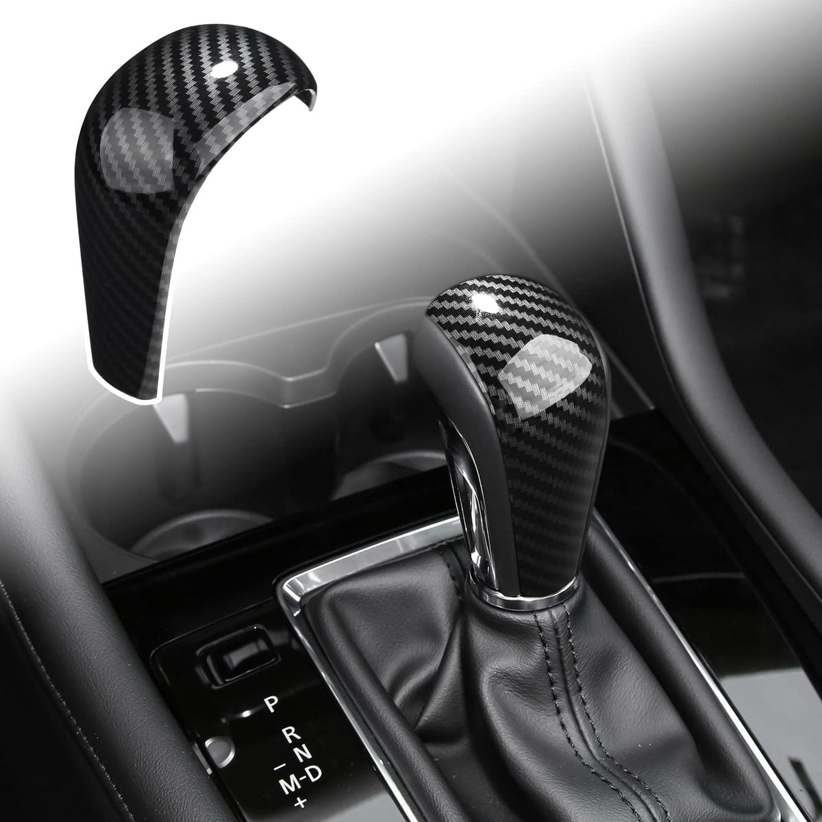 ANFOKAS gear shift knob cover in carbon fiber style enhances cockpit aesthetics and protects the knob.