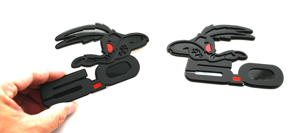 Anyfew Coyote 5.0 emblem badge packaging in black red.