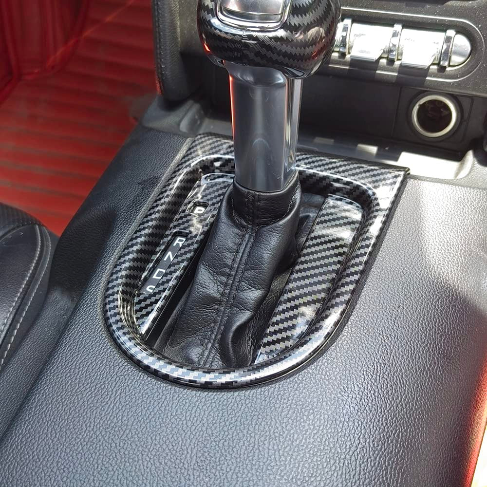 AOKIO carbon-fiber-look trim on dash offers stylish, modern vibe