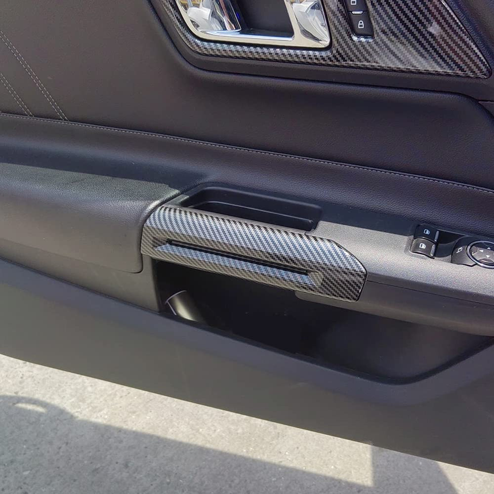 AOKIO Mustang carbon-style handle cover with adhesive back for easy installation.