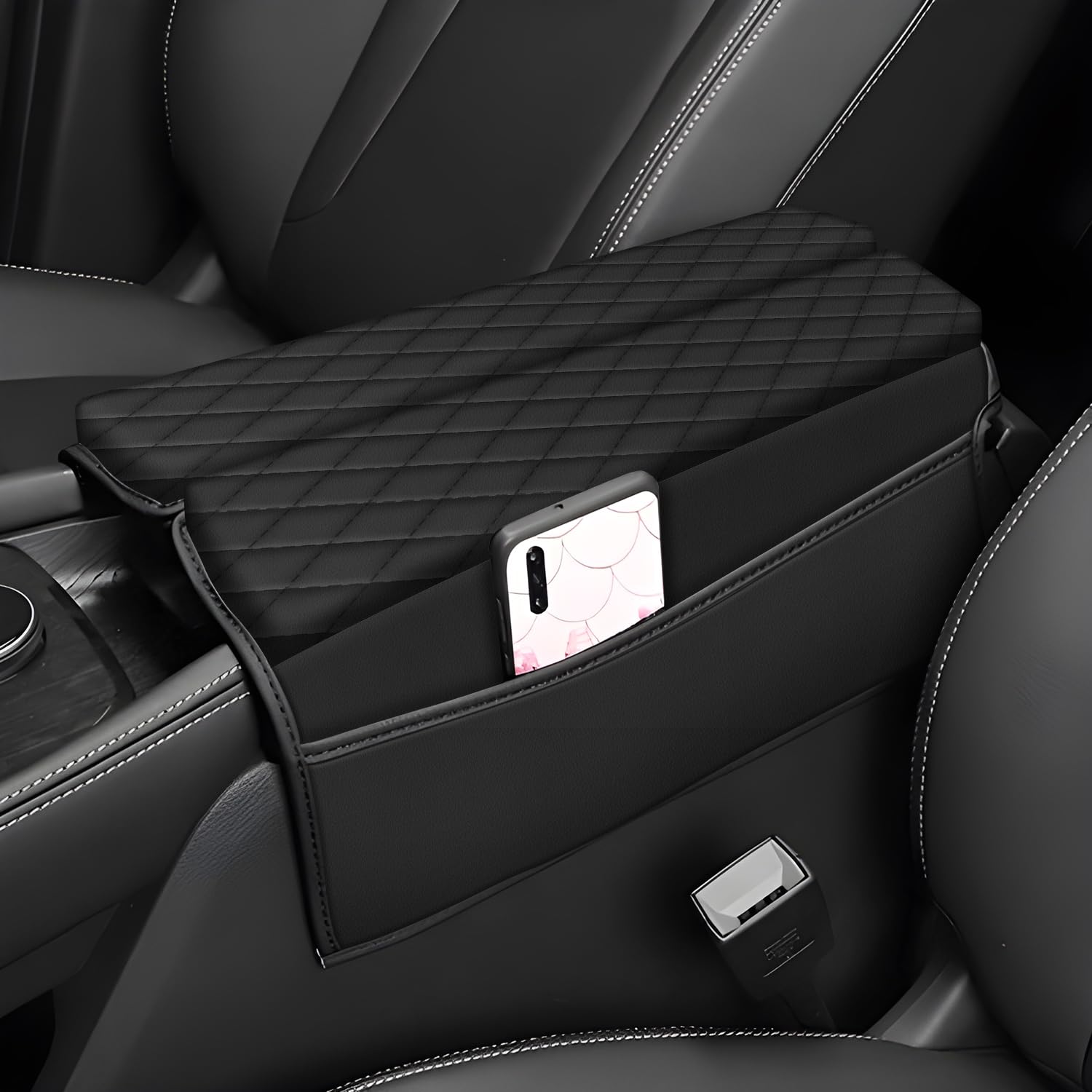 AOMSAZTO Rogue armrest cover in black leather protects the center console.