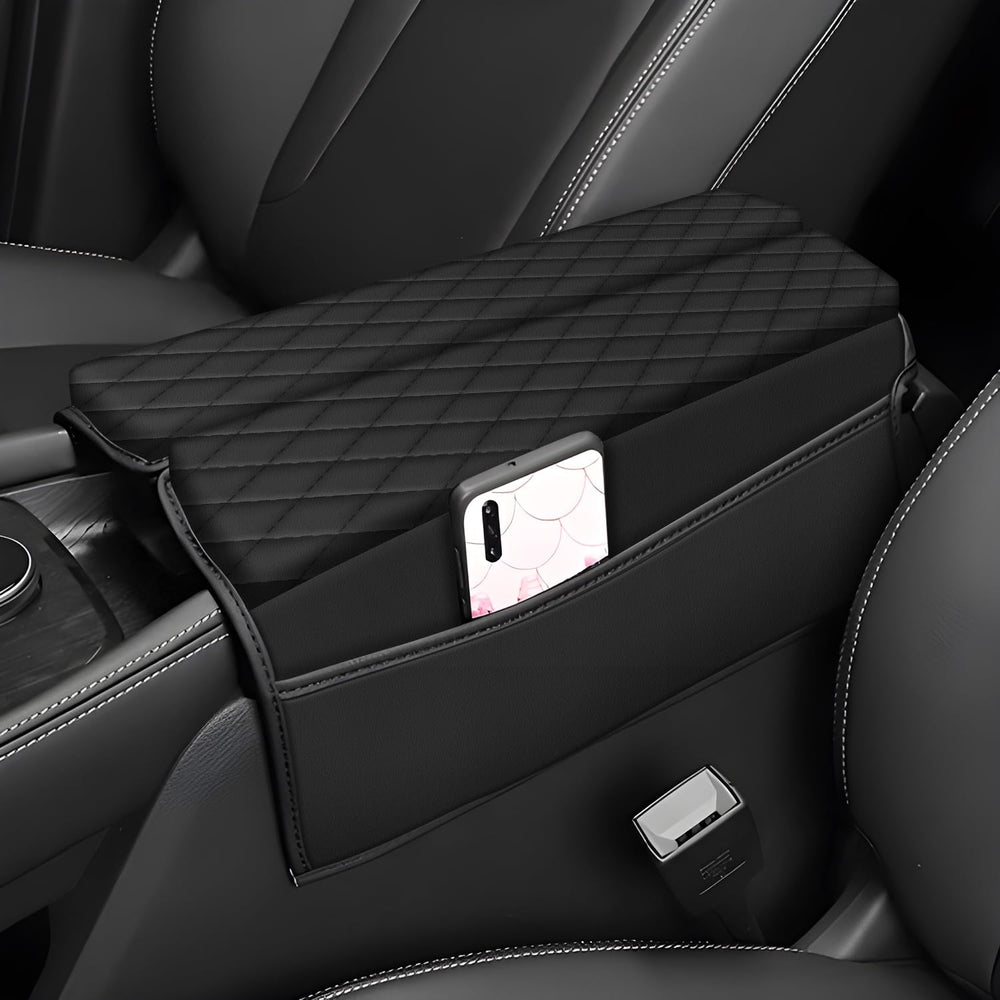 AOMSAZTO Rogue armrest cover in black leather protects the center console.