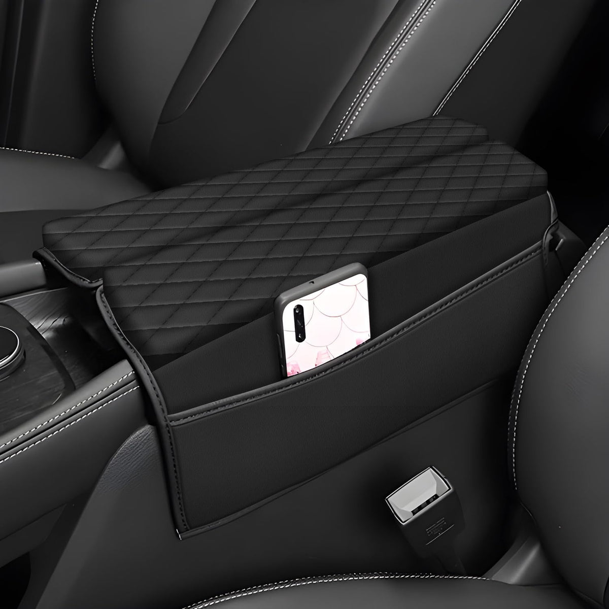 AOMSAZTO Rogue armrest cover in black leather protects the center console.