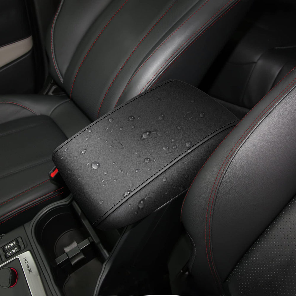 AOMSAZTO Forester armrest cover in black stitches shields the armrest from wear and dirt.