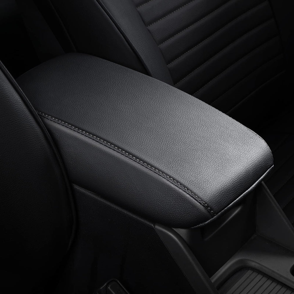 AOMSAZTO Forester center console cover in black protects the area while keeping it clean.