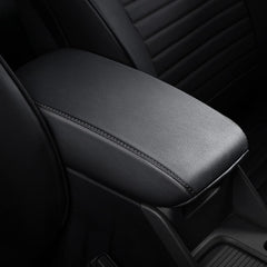 AOMSAZTO Forester center console cover in black protects the area while keeping it clean.