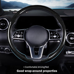 Close-up of glossy black carbon fiber texture on Aotoyou wheel cover.