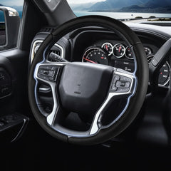 Aotoyou steering wheel cover on Silverado 2500/3500 for enhanced control.