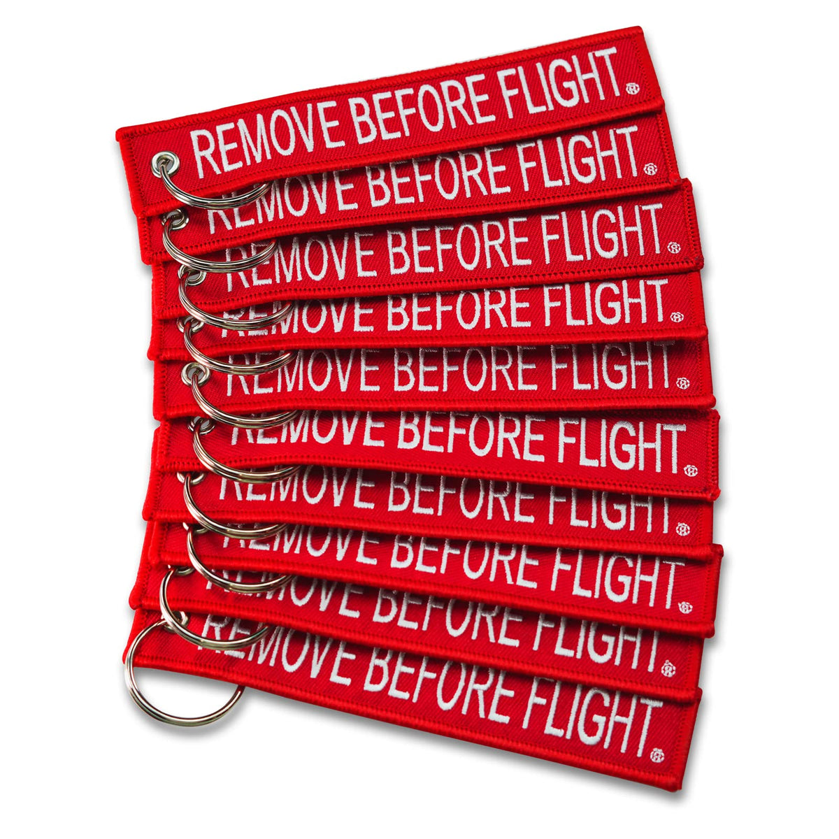 Apex Imports AIXEPA remove-before-flight keychain in red and white for travel reminders.