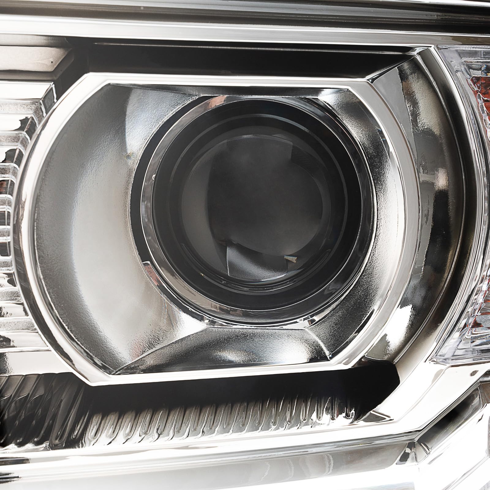 APSVE front-view headlight with chrome housing and clear lens for modern look