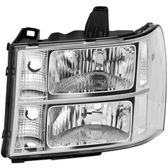 APSVE headlight passenger-side clear lens maintains daytime clarity on GMC Sierra.