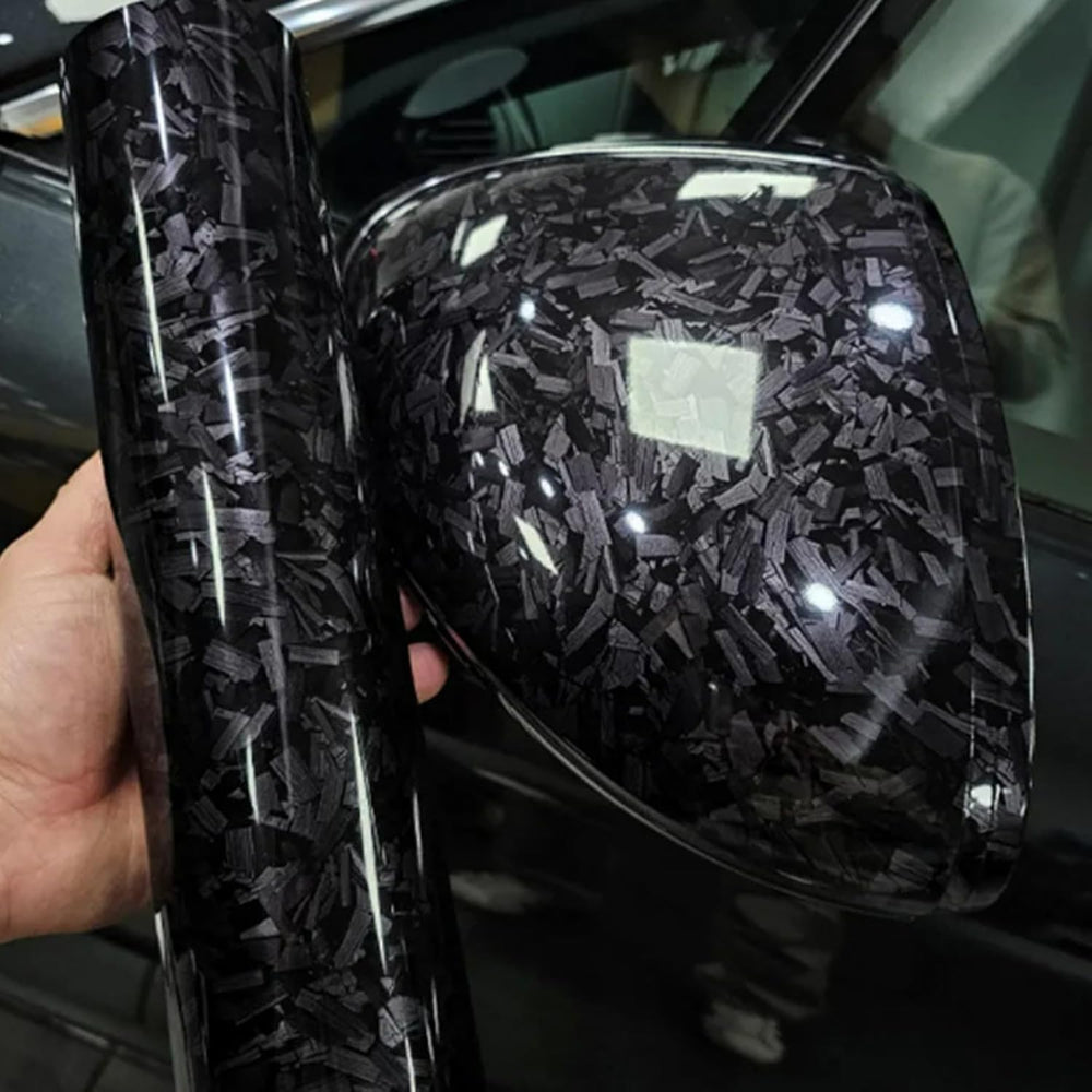 Arespark gloss forged carbon wrap on car door panel adds premium style