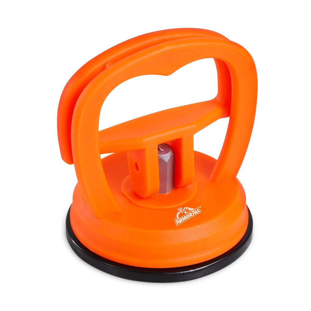 Armor All Multi-surface Dent Puller in use across surfaces.