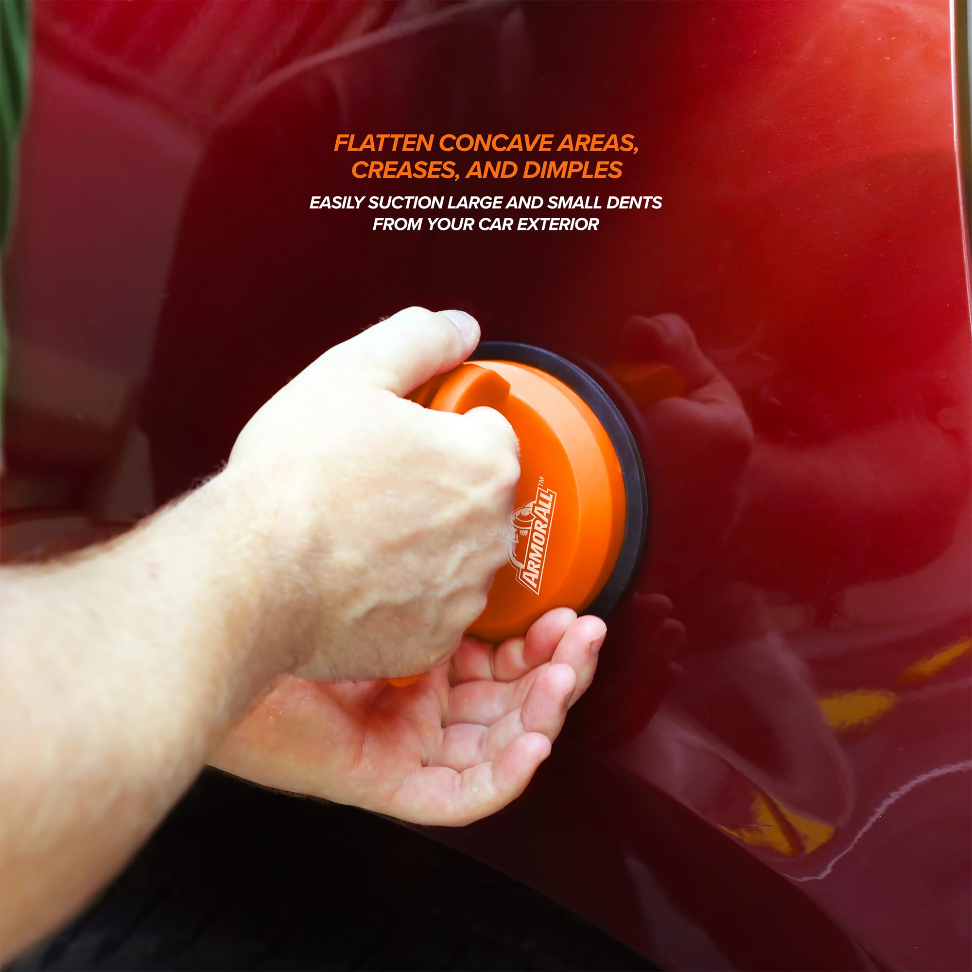 Armor All Dent Puller suction cup close-up with secure grip.