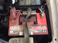 ARONOVA hold-down kit installed on 4Runner and Tacoma for stable battery support.