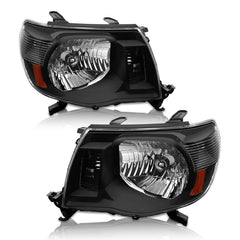 AS Tacoma headlight assembly with black housing and amber reflector improves nighttime visibility.