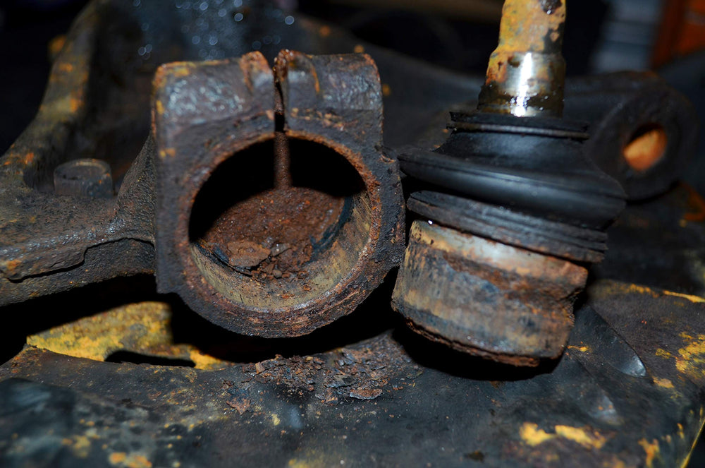 AP Astro 78620A on jack stands simplifies difficult ball joint removal.