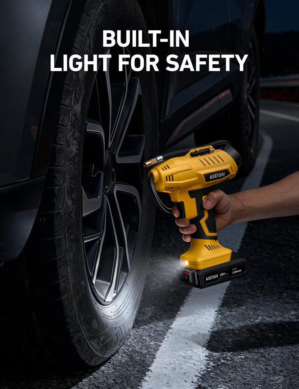 AstroAI built-in LED light illuminating a tire at night for safer use