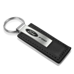 AU-TOMOTIVE GOLD F-150 silver plate laser-engraved logo for lasting shine.
