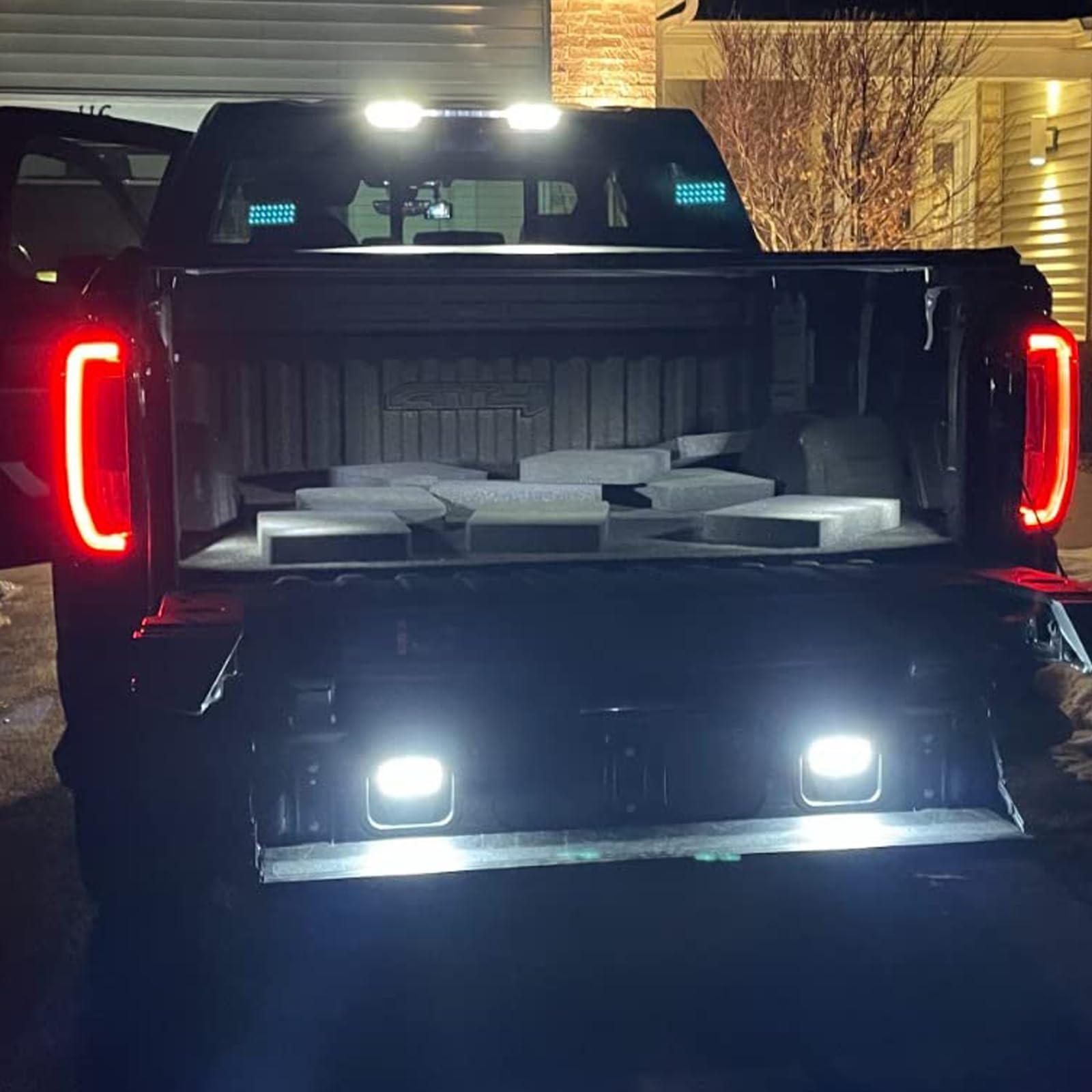 Autboom two-pack tailgate lights provide balanced bed illumination.