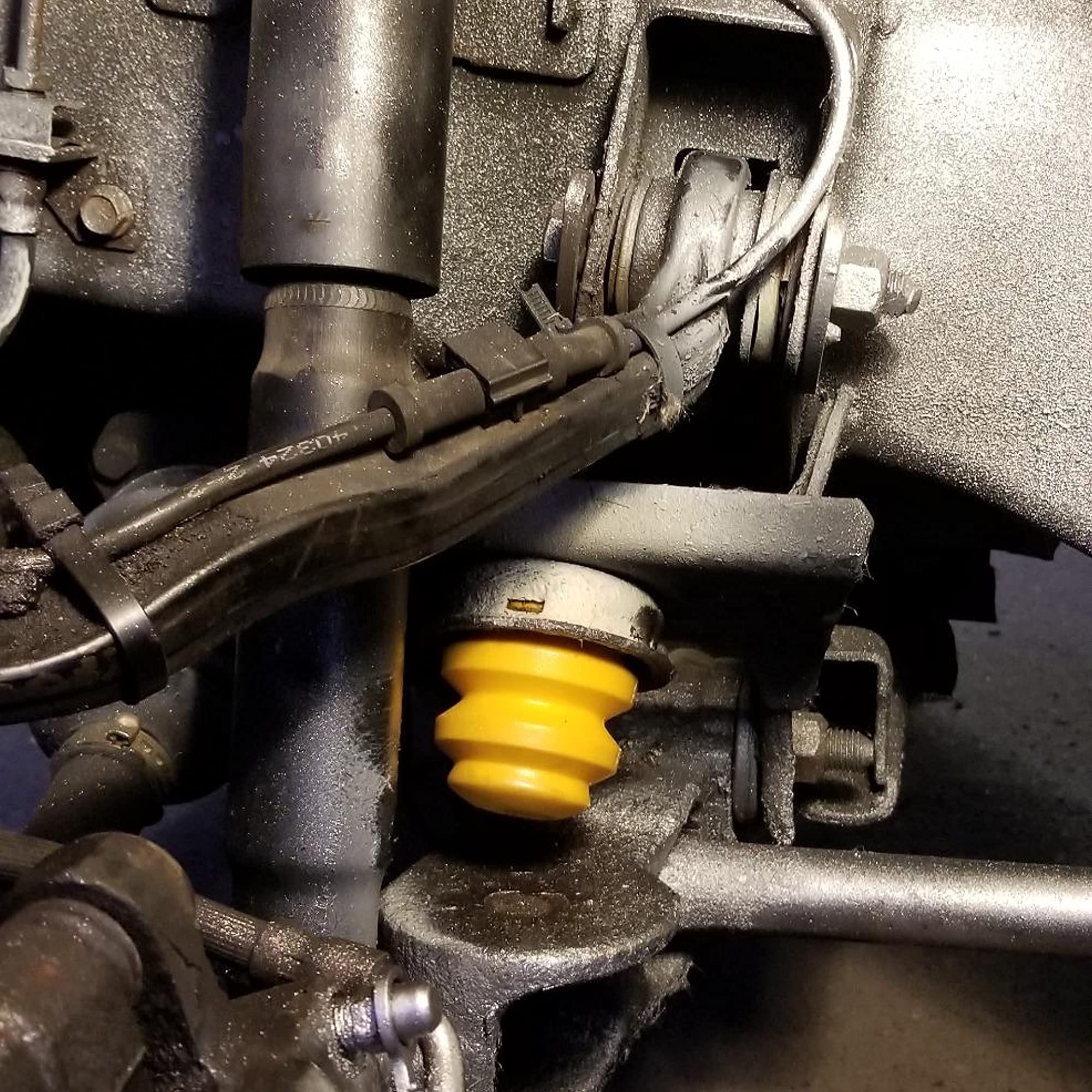 Autoacc front bump stop close-up showing the fit and tab engagement.