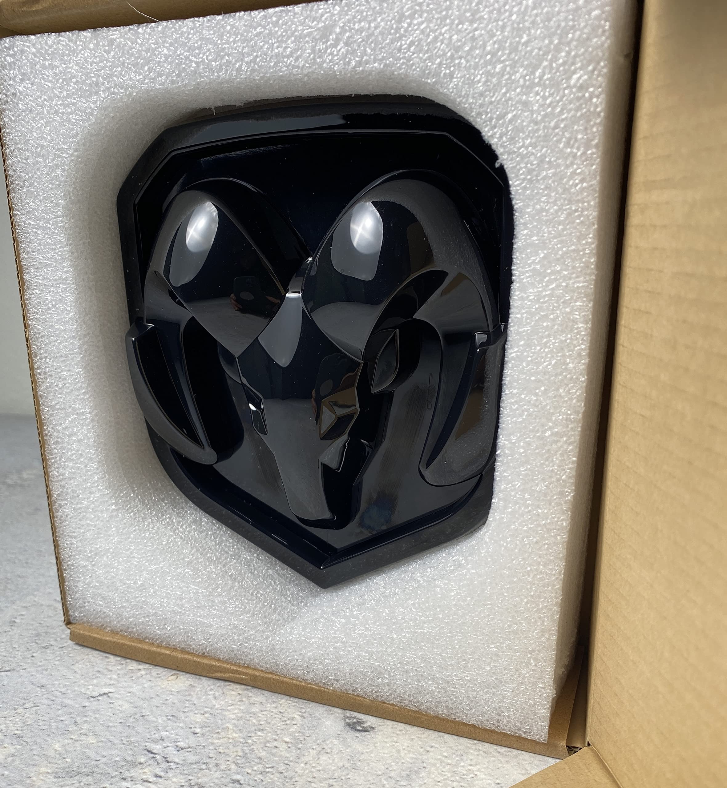 Autogem flat black RAM emblem on 3500 shows bold, high-gloss presence.