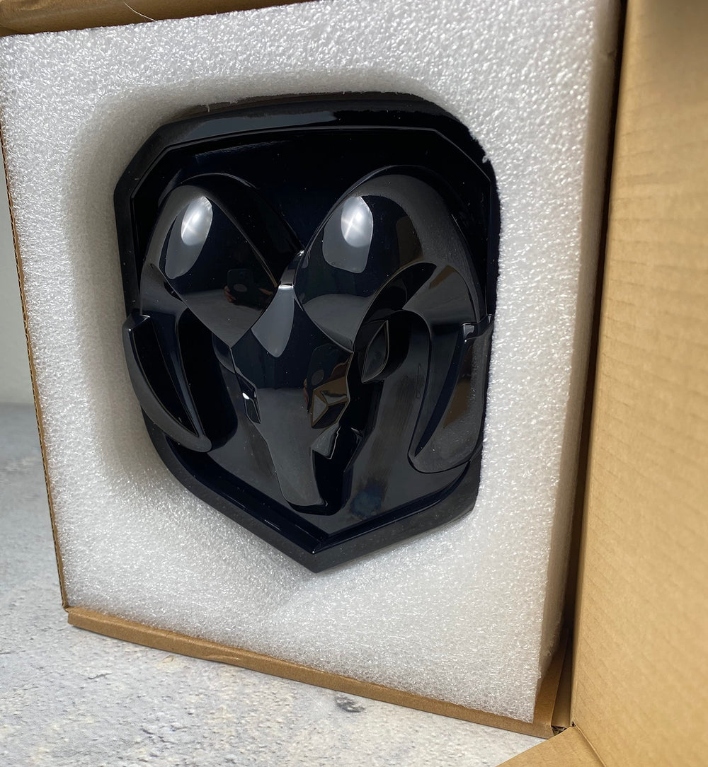 Autogem flat black RAM emblem on 3500 shows bold, high-gloss presence.