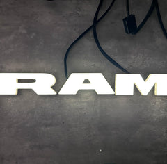 Autogem lighted grille emblem on RAM front view enhances daytime and nighttime visibility