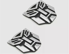 Autogem transforming robot emblem with chrome finish enhances exterior style.