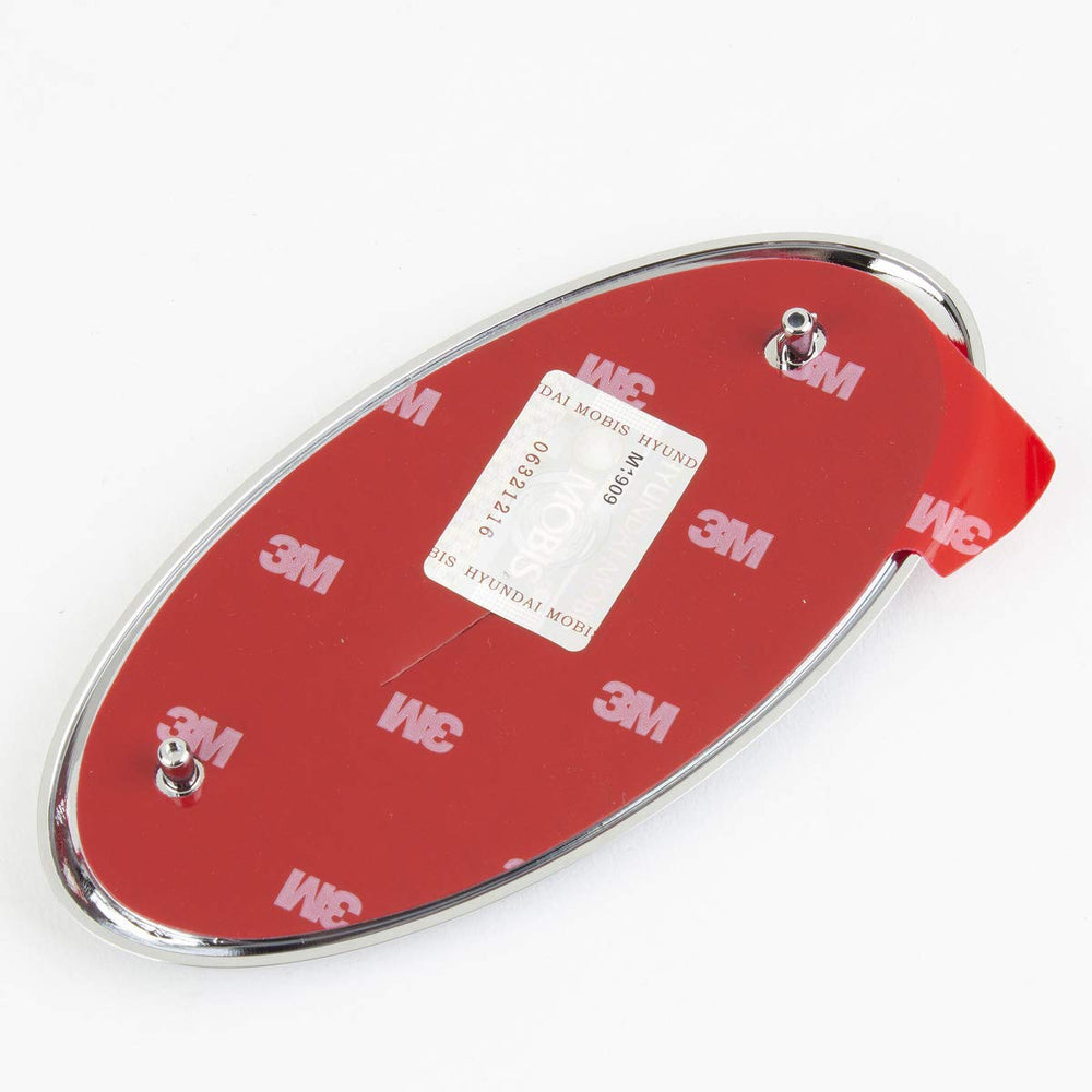 AutomotiveApple Kia emblem packaging demonstrates genuine parts for replacement projects.