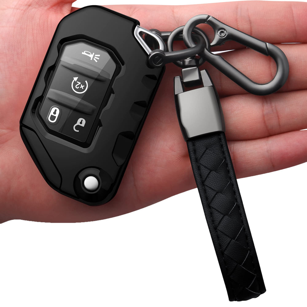 Autophone Jeep key fob cover with leather keychain in black, providing durable protection.