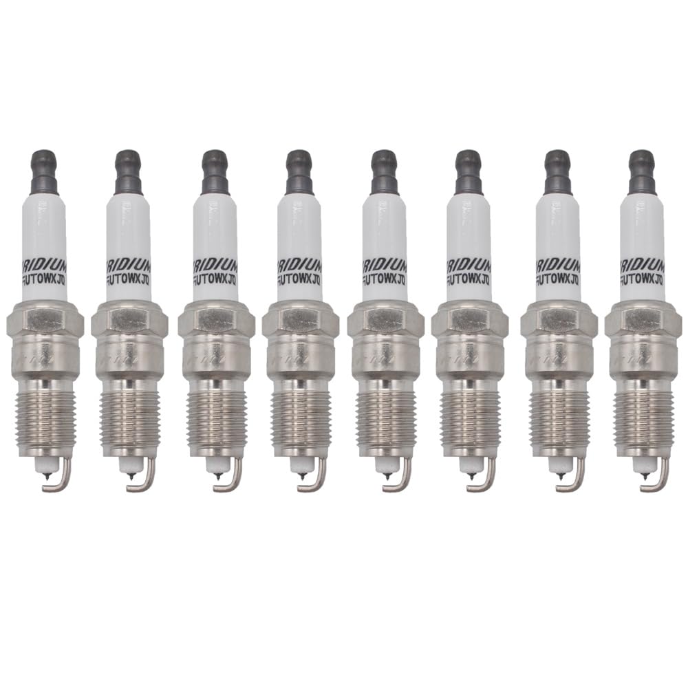 Autowxjq Iridium spark plug in engine bay demonstrates quick, direct-fit pre-gap installation.