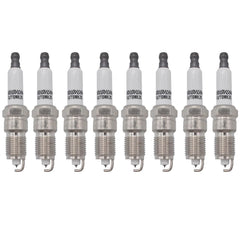 Autowxjq Iridium spark plug in engine bay demonstrates quick, direct-fit pre-gap installation.