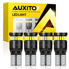 AUXITO 194 LED bulb emits bright 6000K white light for interior clarity.