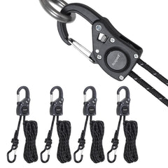 Ayaport rope tie-down ratchet with carabiner clip securing gear on a roof rack