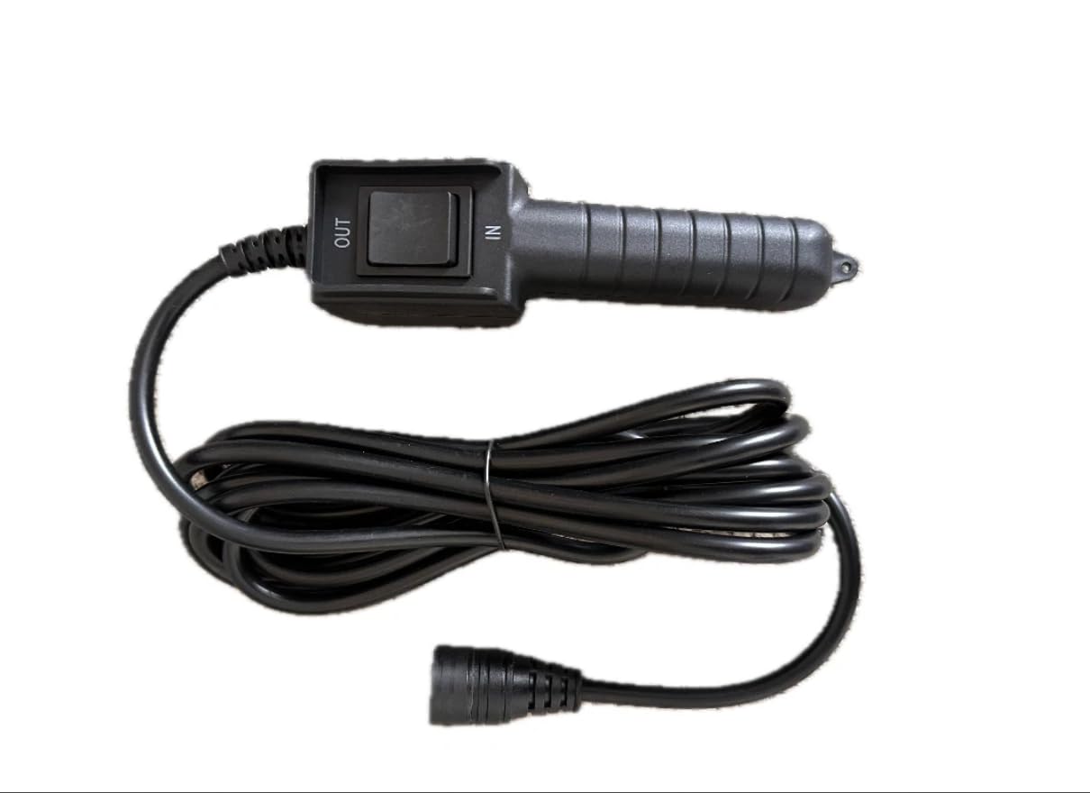 Badlands remote switch for winch with a five-prong C-shaped connector for secure control.