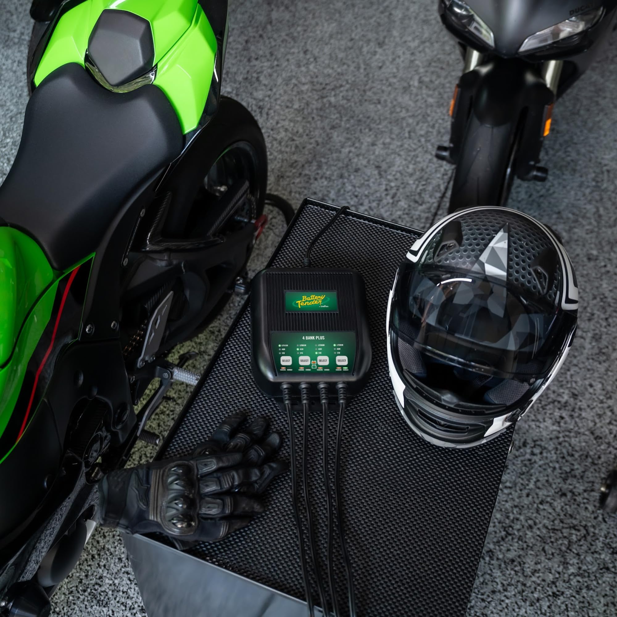 Battery Tender Plus 4-Bank back panel shows timer and safety features.