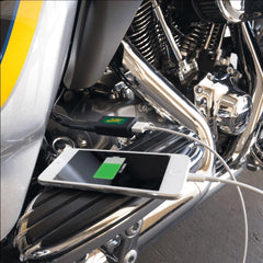  Battery Tender Quick Disconnect USB Charger Adapter in use powering a GPS outdoors.