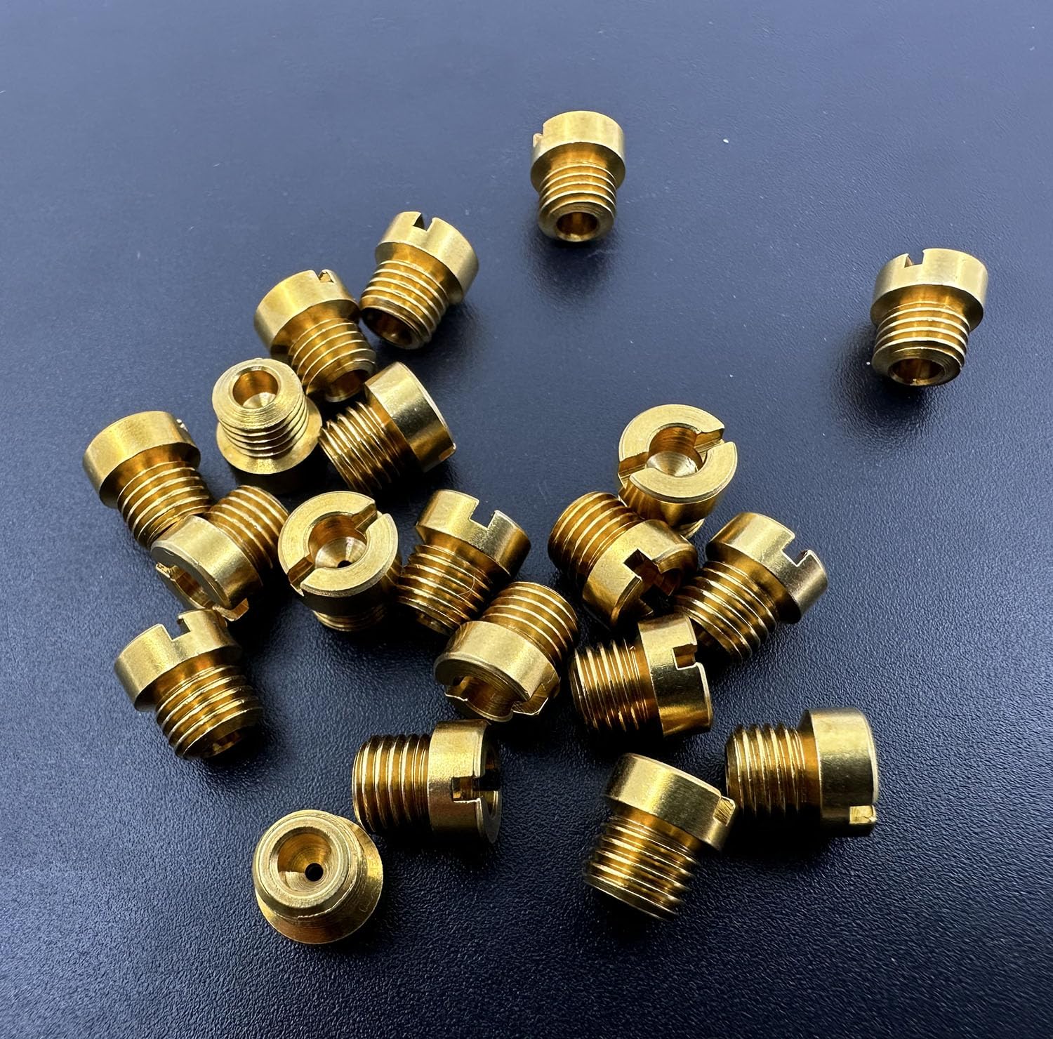 Detail view of 72-73 jets showing fine threading and fit.