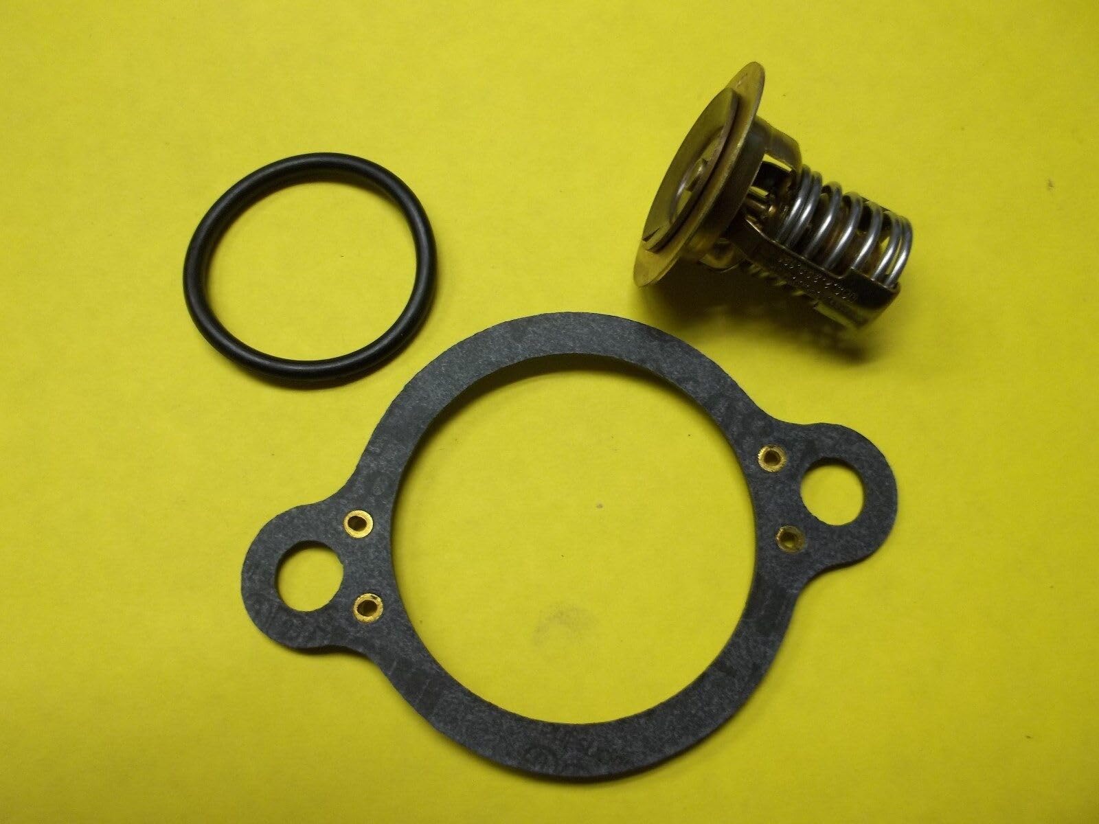B.B. 160°F thermostat pictured, helps stabilize temperature in Volvo and OMC marine engines.