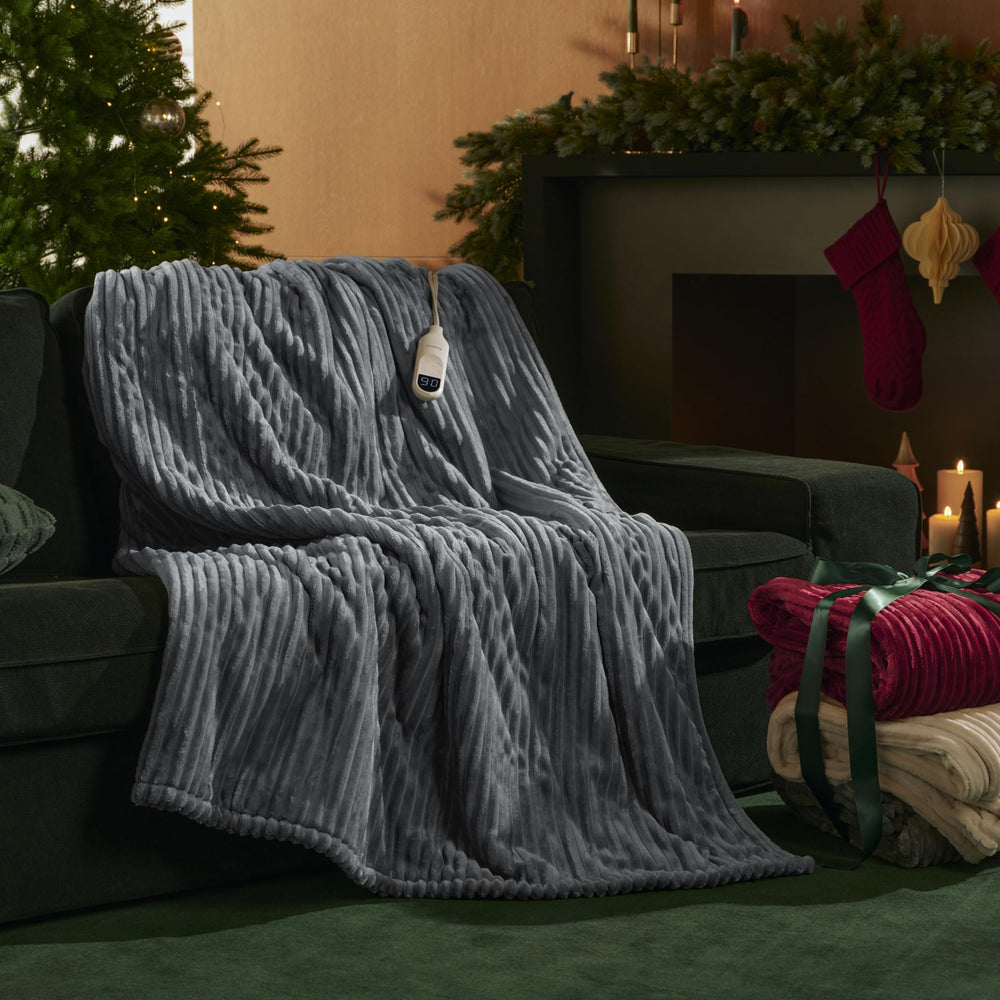 Bedsure GentleSoft heated blanket throw grey in living room setting for movie nights