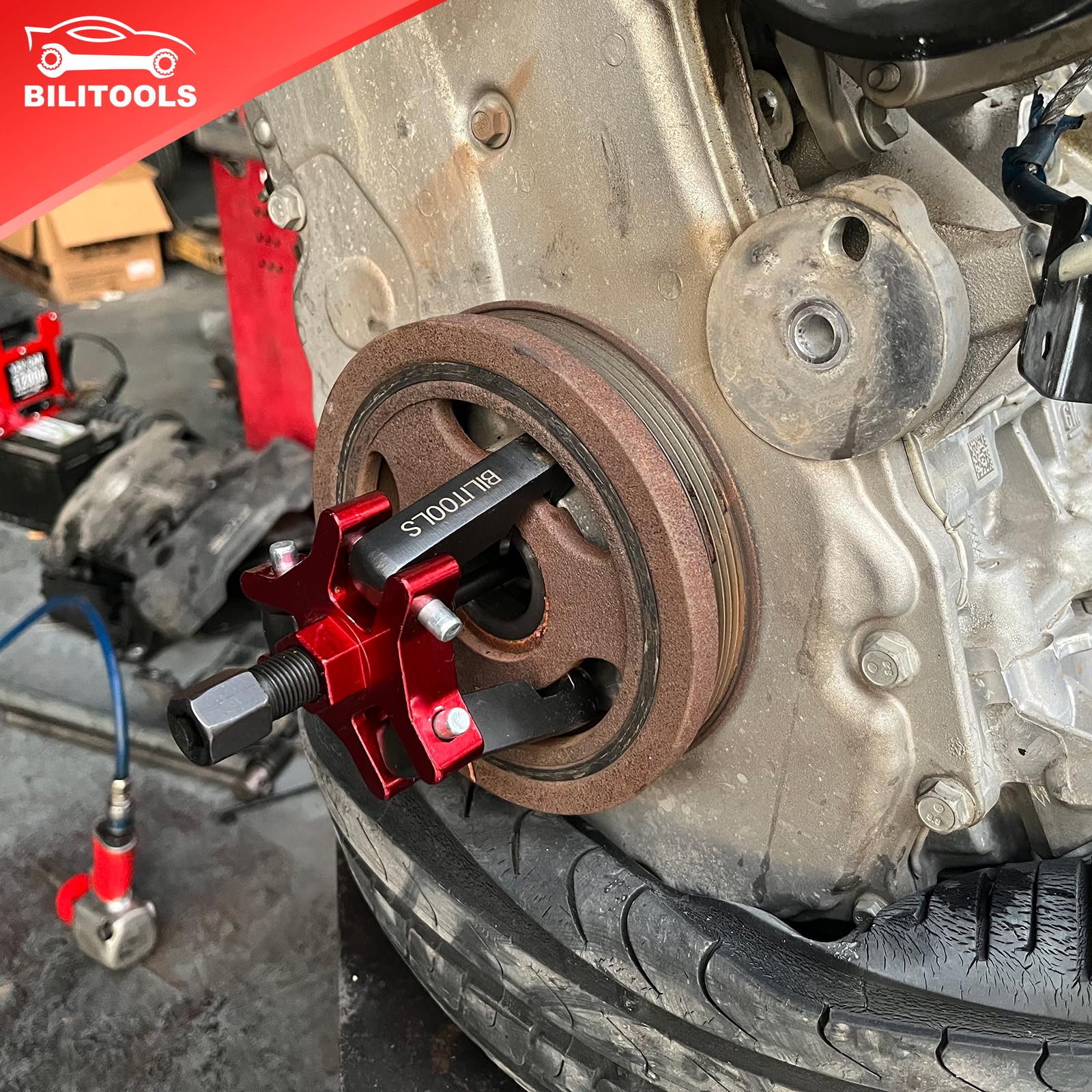 Bilitoools puller setup in tight engine bay enables damper removal without radiator removal