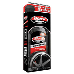 Black Magic Tire Wet Gel bottle applying a deep gloss with long-lasting, minimal sling.