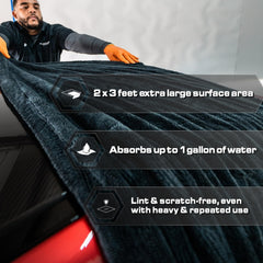 Blackline drying towel gliding across a car surface without scratches