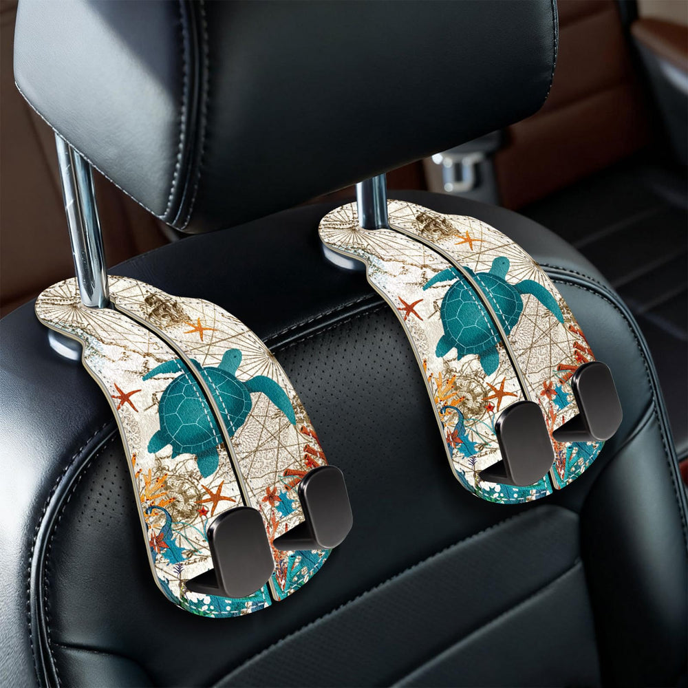Blusabaca sea turtle purse hanger on car seat backrest for clutter-free trips.