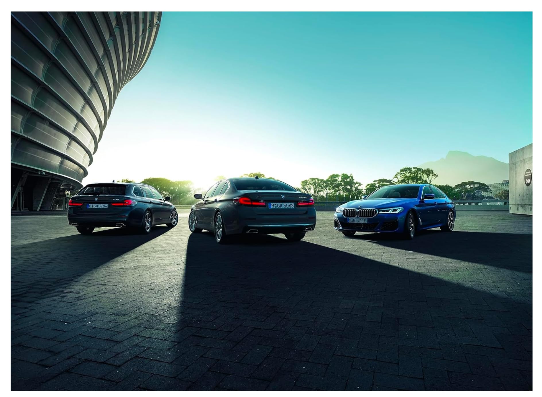 BMW filter element being handled by hand emphasizes clean, tool-friendly installation.