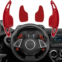 Bonbo red aluminum shift paddle extension on Camaro interior for enhanced grip.