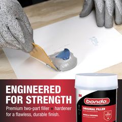 Bondo two-part mixture in tin enables smooth, easy spreading.